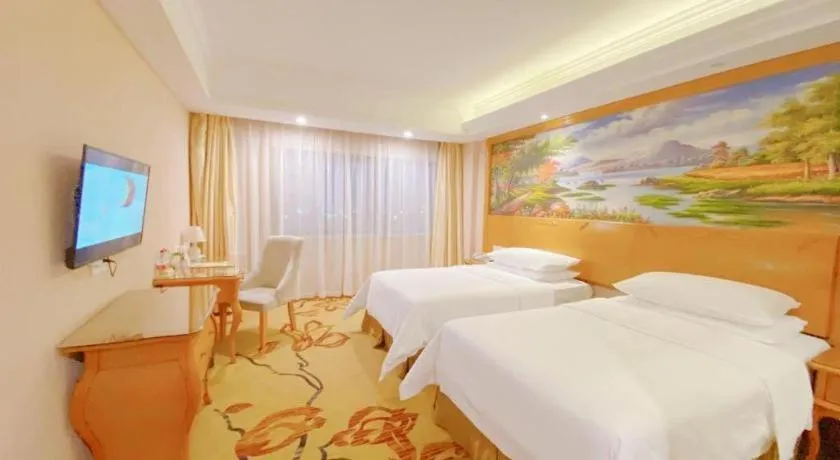 Bed in Vienna Hotel Suzhou Yangcheng Lake Fashion Stage