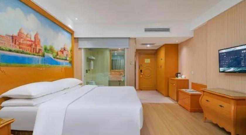 Bed in Vienna Hotel Suzhou Yangcheng Lake Fashion Stage