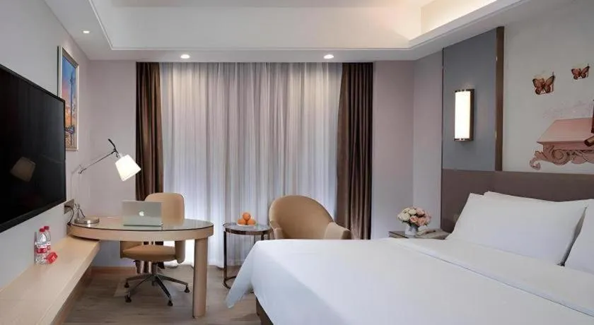 Bed in Vienna Hotel Guangzhou Panyu Square