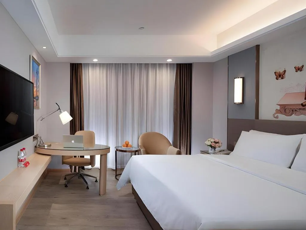 Bed in Vienna Hotel Guangzhou Panyu Square