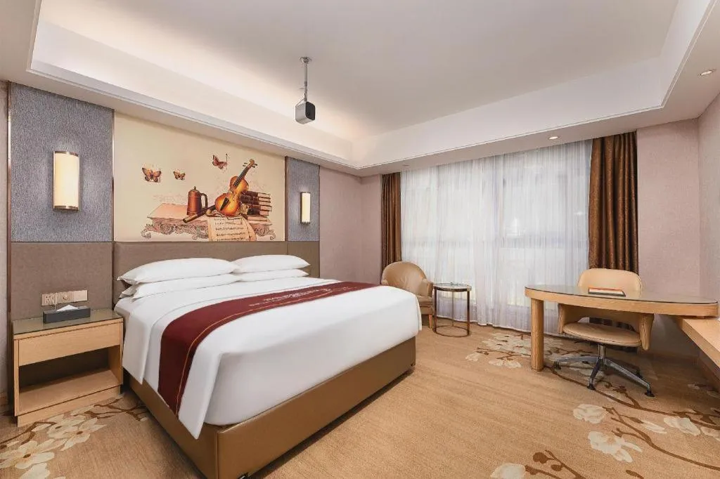 Bed in Vienna Hotel Guangzhou Panyu Square