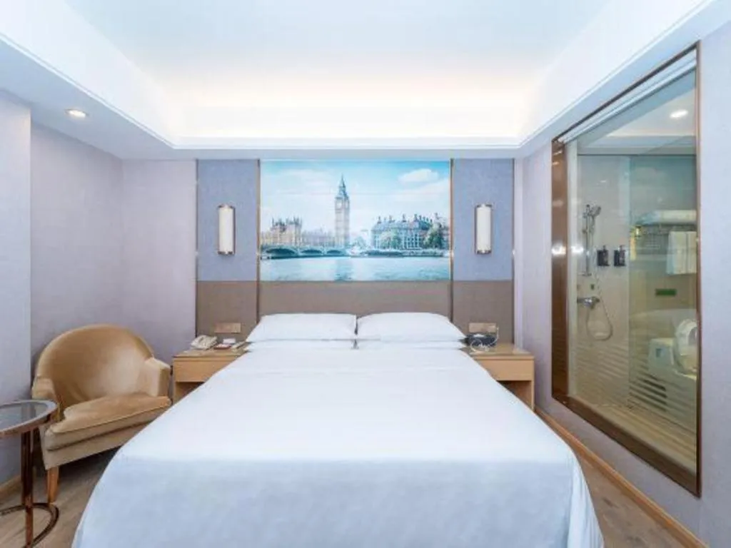 Bed in Vienna Hotel Guangzhou Panyu Square