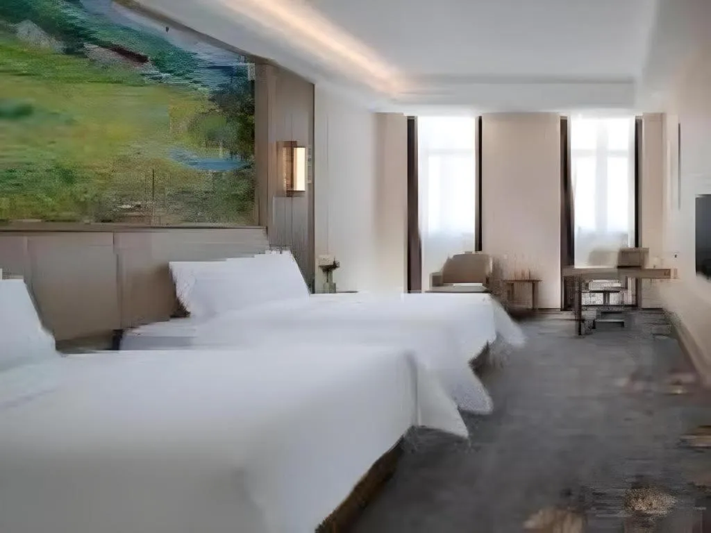 Bed in Vienna Hotel Shenzhen Pingshan Longtian Town