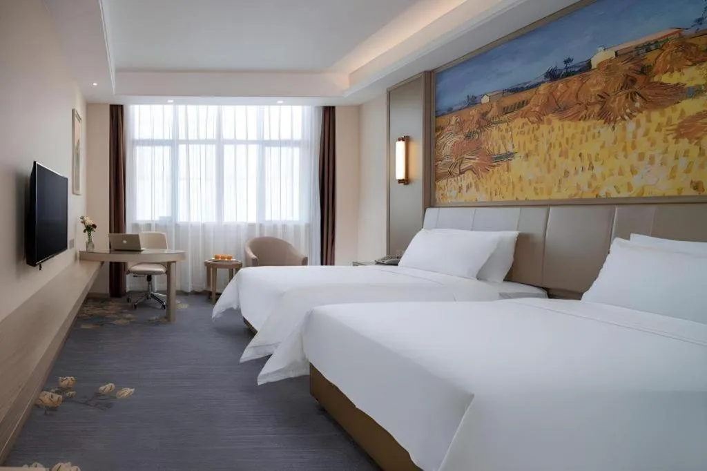 Bed in Vienna Hotel Shenzhen Pingshan Longtian Town