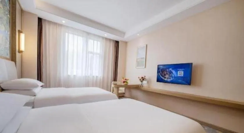 Bed in Vienna Hotel Shenzhen Pingshan Longtian Town