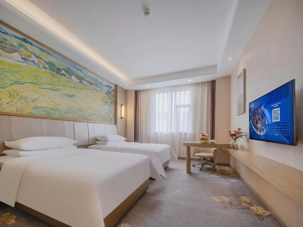 Bed in Vienna Hotel Shenzhen Pingshan Longtian Town