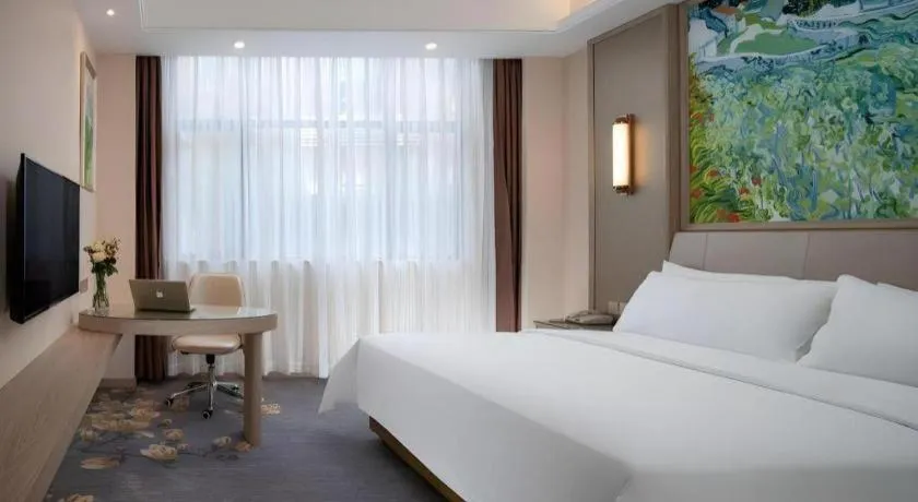 Bed in Vienna Hotel Shenzhen Pingshan Longtian Town