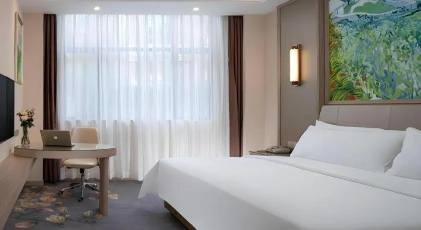 Bed in Vienna Hotel Shenzhen Pingshan Longtian Town