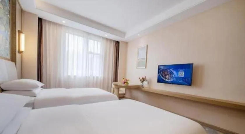 Bed in Vienna Hotel Shenzhen Pingshan Longtian Town
