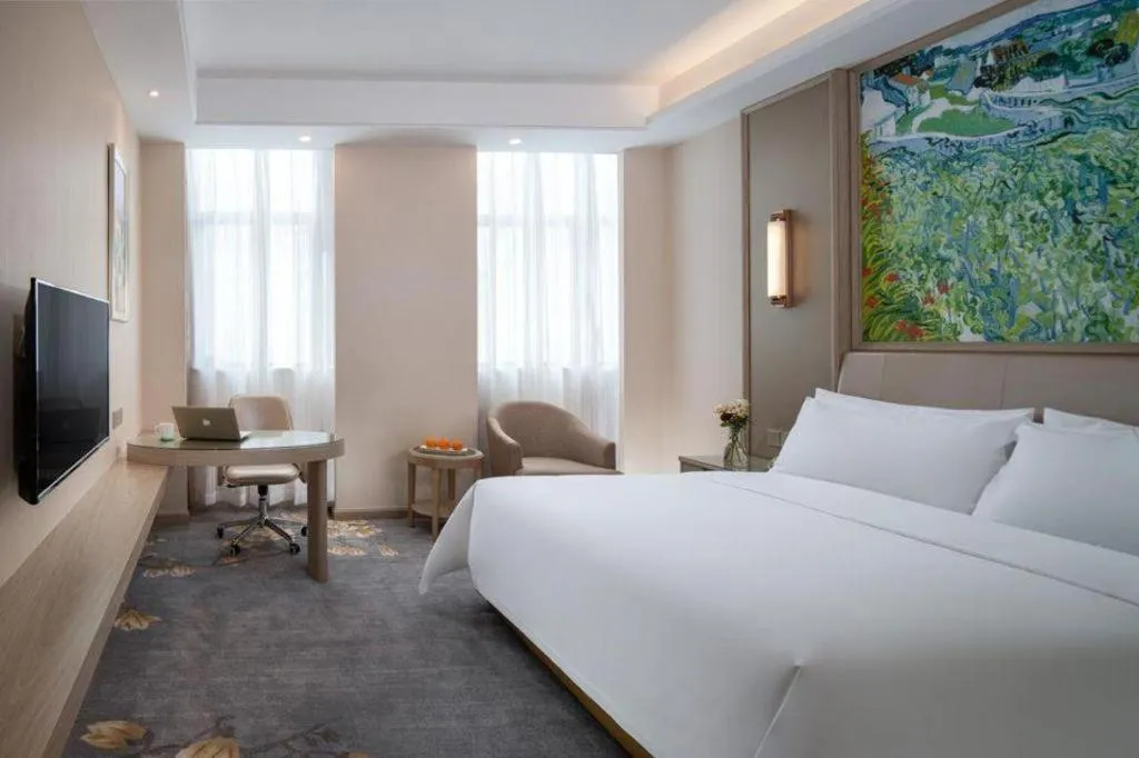 Bed in Vienna Hotel Shenzhen Pingshan Longtian Town