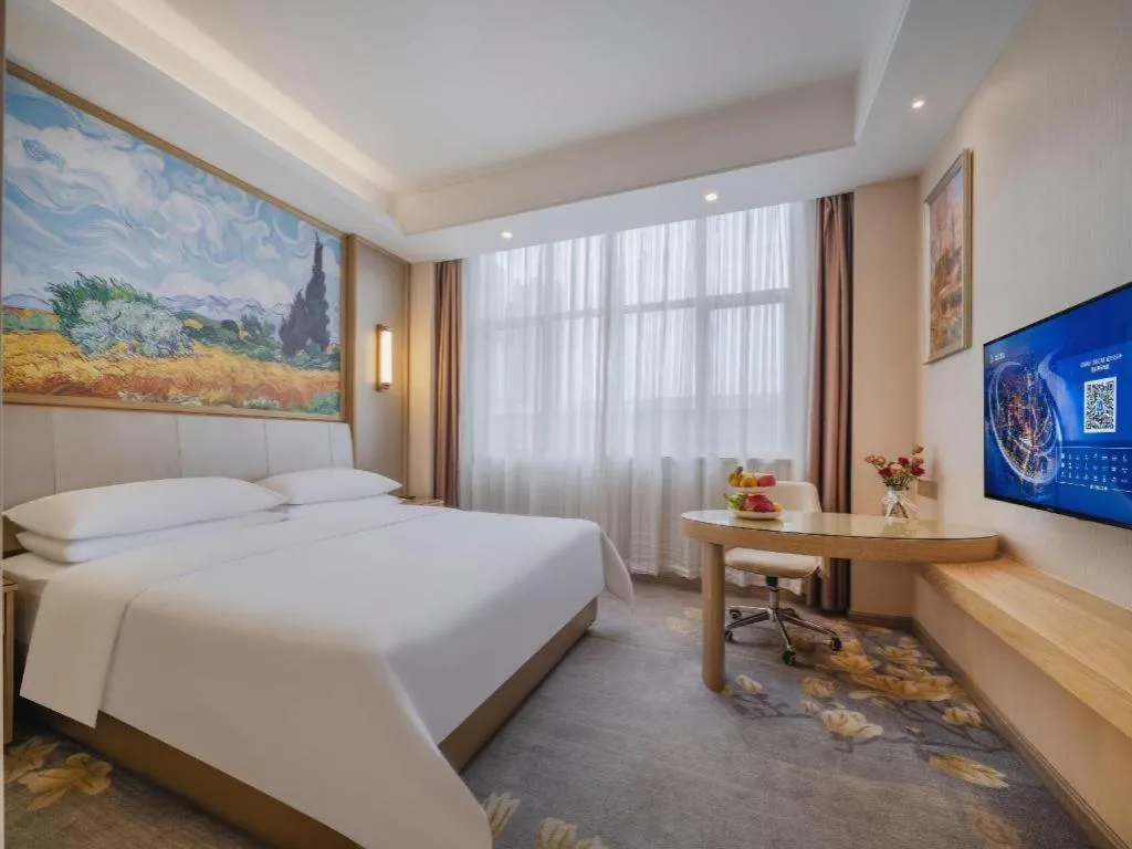 Bed in Vienna Hotel Shenzhen Pingshan Longtian Town