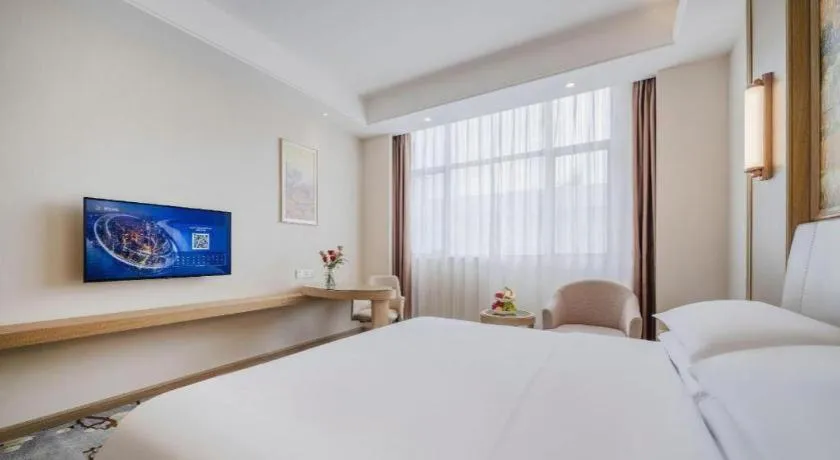 Bed in Vienna Hotel Shenzhen Pingshan Longtian Town