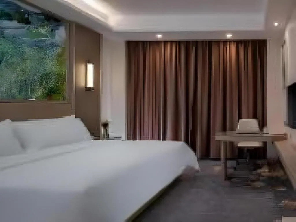 Bed in Vienna Hotel Shenzhen Pingshan Longtian Town