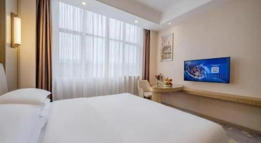 Bed in Vienna Hotel Shenzhen Pingshan Longtian Town
