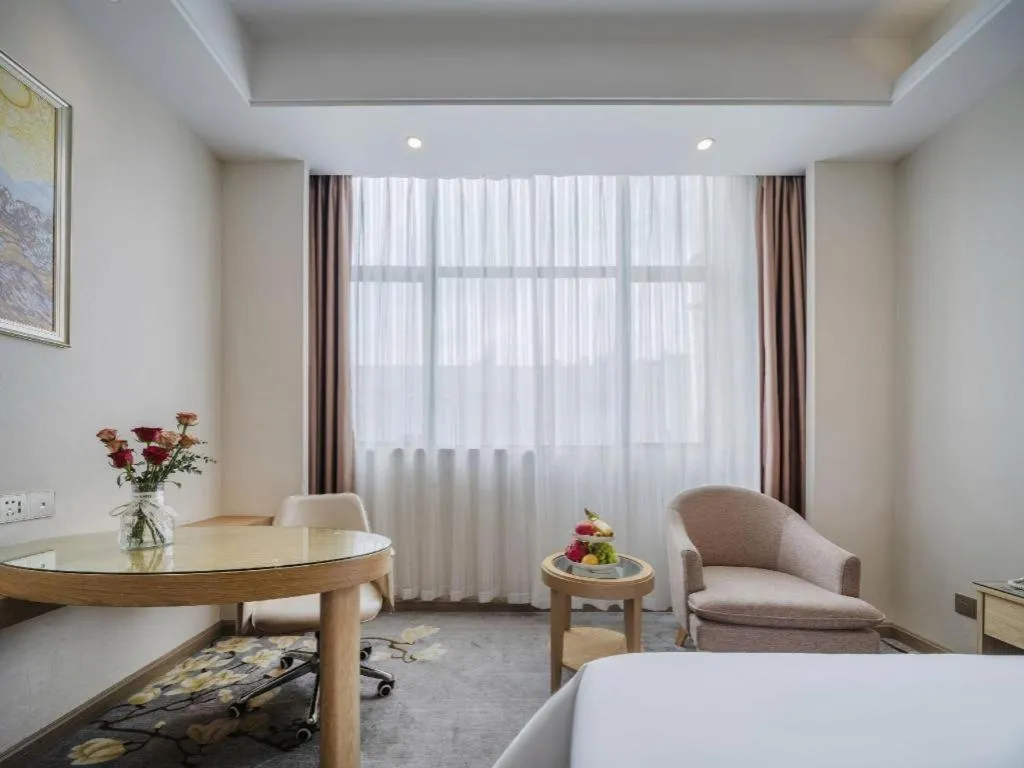 Bed in Vienna Hotel Shenzhen Pingshan Longtian Town