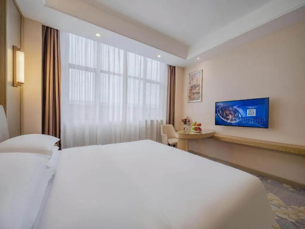 Bed in Vienna Hotel Shenzhen Pingshan Longtian Town