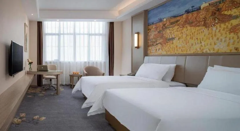 Bed in Vienna Hotel Shenzhen Pingshan Longtian Town