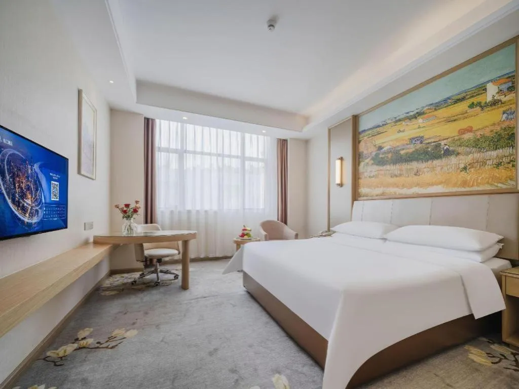 Bed in Vienna Hotel Shenzhen Pingshan Longtian Town