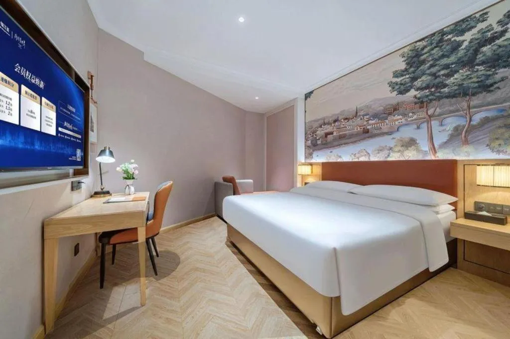 Bed in Vienna Hotel Chongqing Wushan Municipal Government