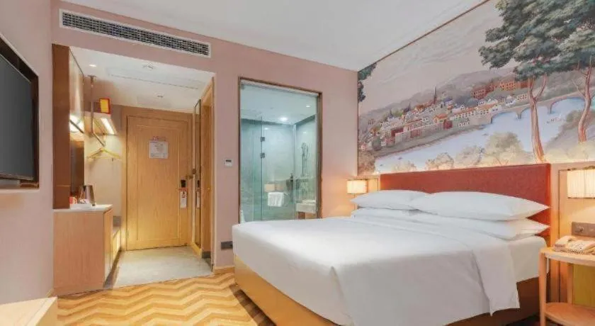 Bed in Vienna Hotel Chongqing Wushan Municipal Government