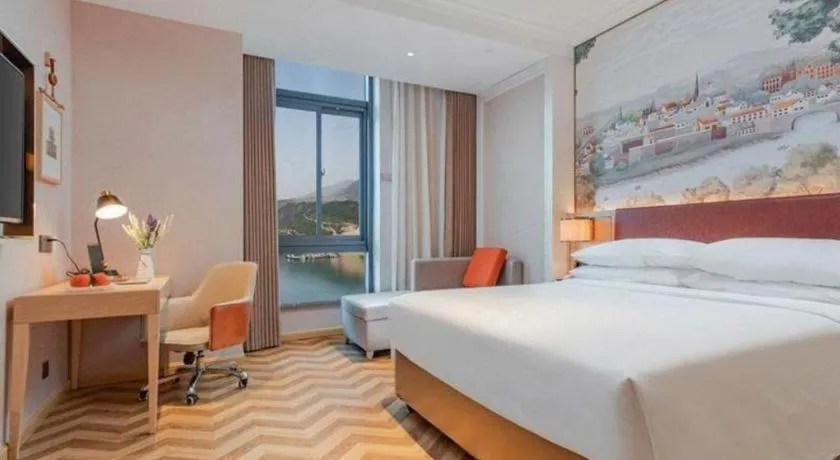 Bed in Vienna Hotel Chongqing Wushan Municipal Government