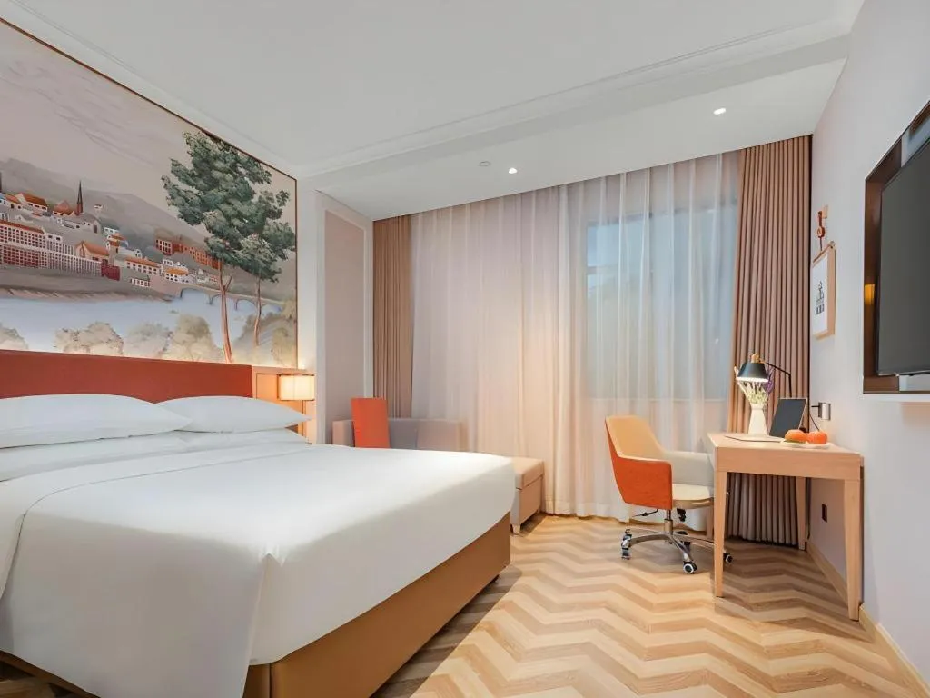 Bed in Vienna Hotel Chongqing Wushan Municipal Government