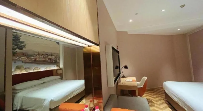 Bed in Vienna Hotel Chongqing Wushan Municipal Government
