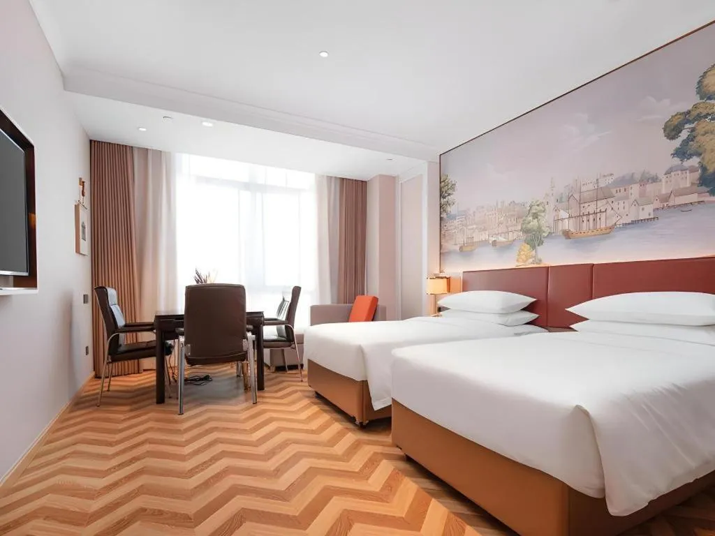 Bed in Vienna Hotel Chongqing Wushan Municipal Government