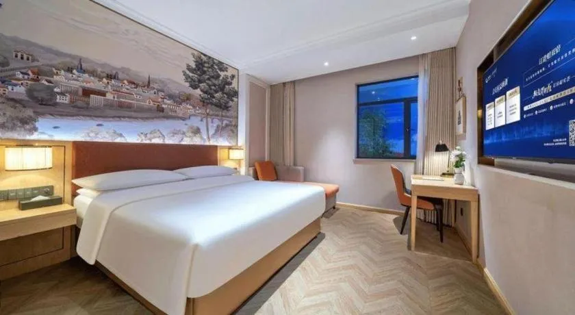 Bed in Vienna Hotel Chongqing Wushan Municipal Government
