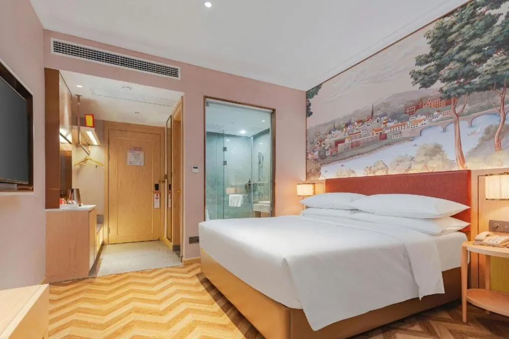 Bed in Vienna Hotel Chongqing Wushan Municipal Government