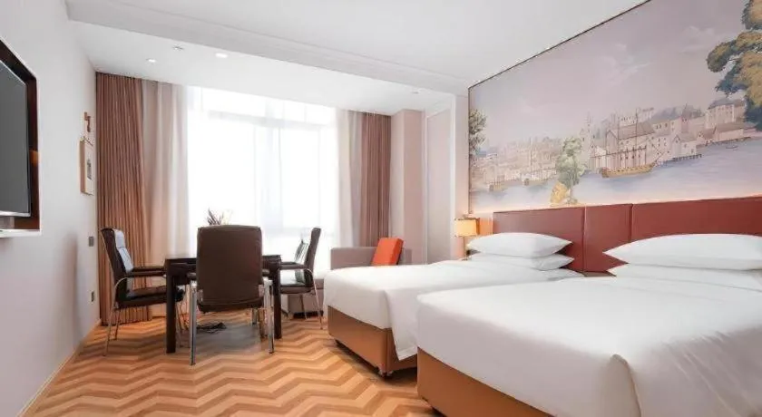 Bed in Vienna Hotel Chongqing Wushan Municipal Government