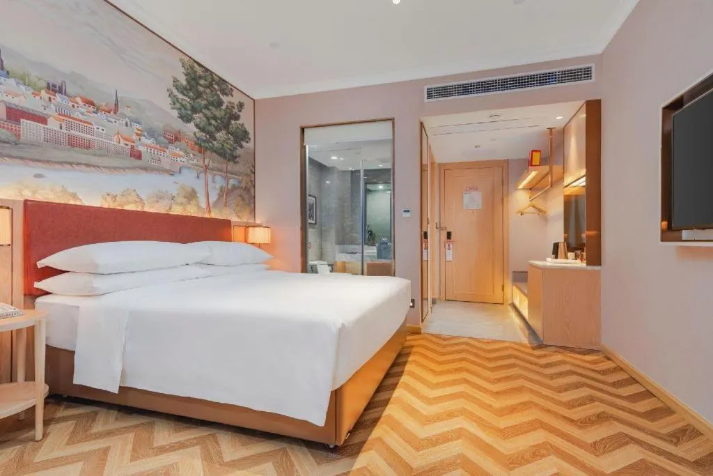 Bed in Vienna Hotel Chongqing Wushan Municipal Government