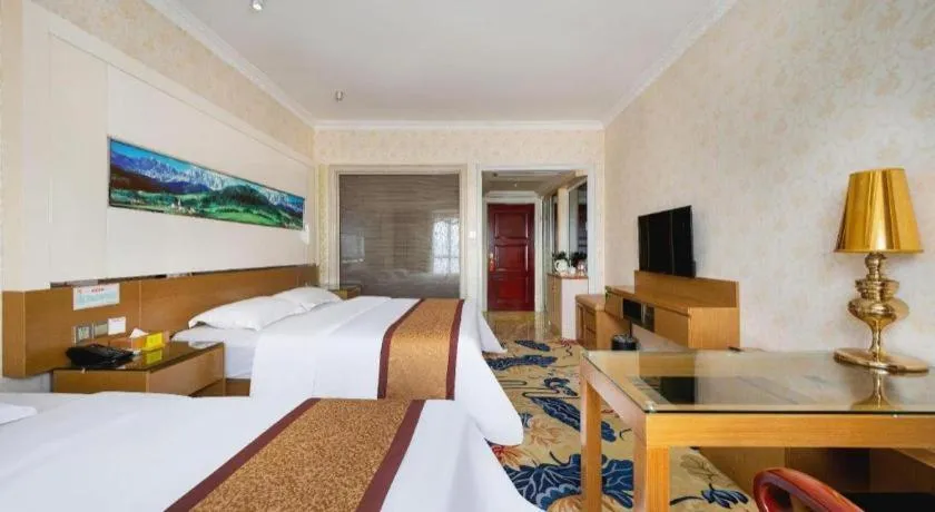 Bed in Vienna Hotel Guangdong Zhuhai Mingzhu Station Guozheng