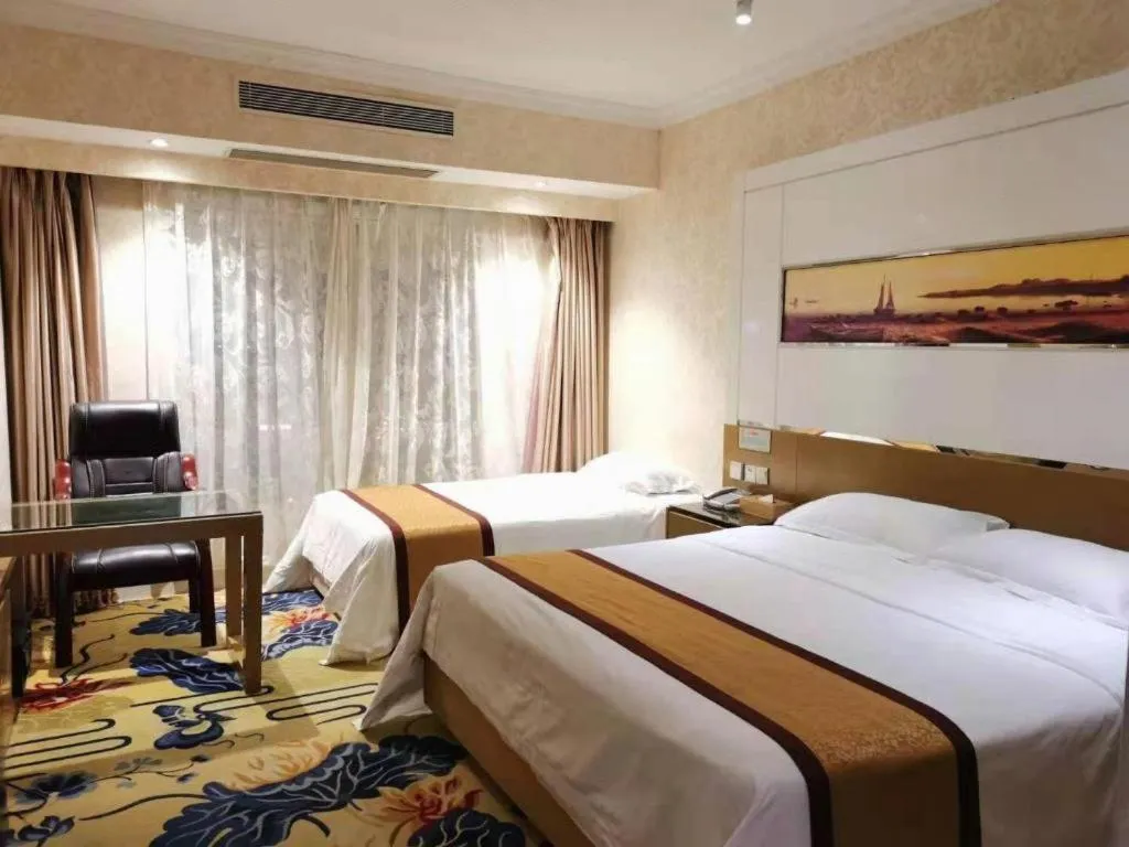 Bed in Vienna Hotel Guangdong Zhuhai Mingzhu Station Guozheng