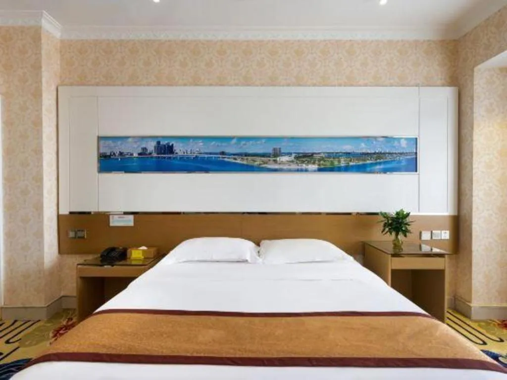 Bed in Vienna Hotel Guangdong Zhuhai Mingzhu Station Guozheng