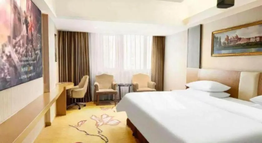Bed in Vienna Hotel Guangzhou Baiyun Airport Huadu Avenue