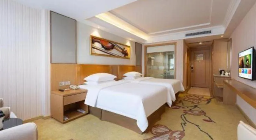 Bed in Vienna Hotel Guangzhou Baiyun Airport Huadu Avenue