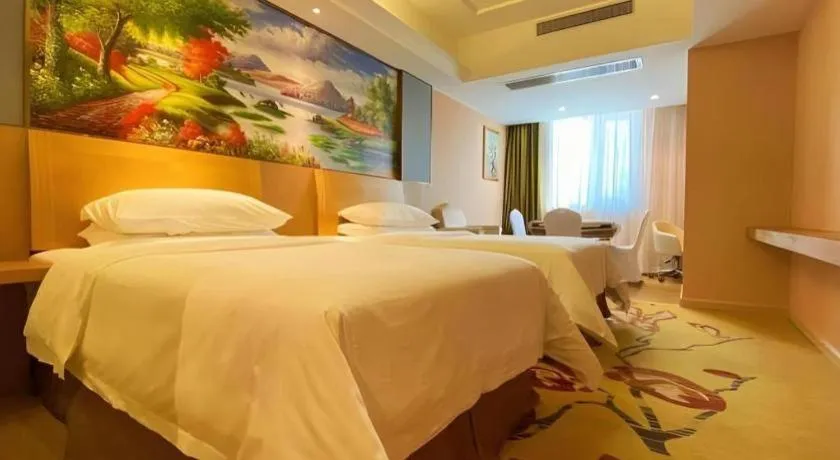 Bed in Vienna Hotel Guangzhou Baiyun Airport Huadu Avenue