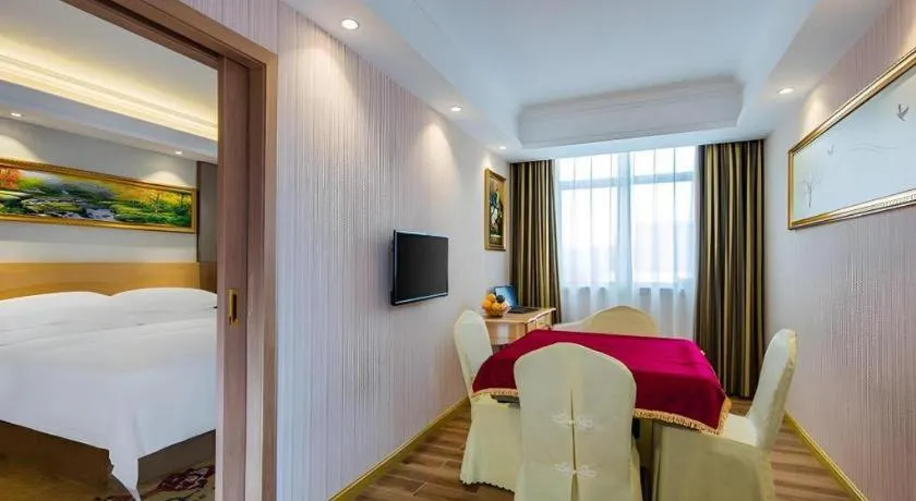 Bed in Vienna Hotel Guangzhou Baiyun Airport Huadu Avenue