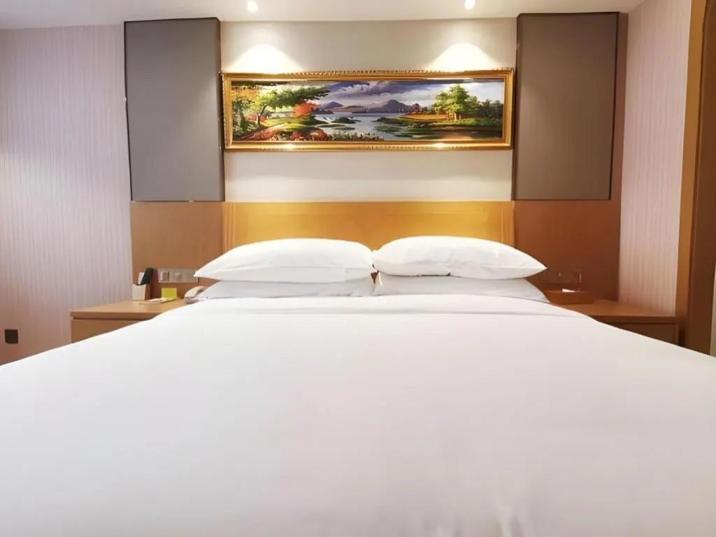 Bed in Vienna Hotel Guangzhou Baiyun Airport Huadu Avenue