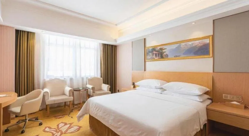 Bed in Vienna Hotel Guangzhou Baiyun Airport Huadu Avenue