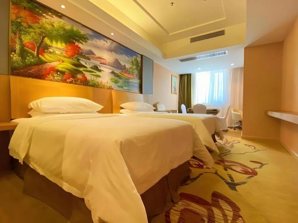 Bed in Vienna Hotel Guangzhou Baiyun Airport Huadu Avenue
