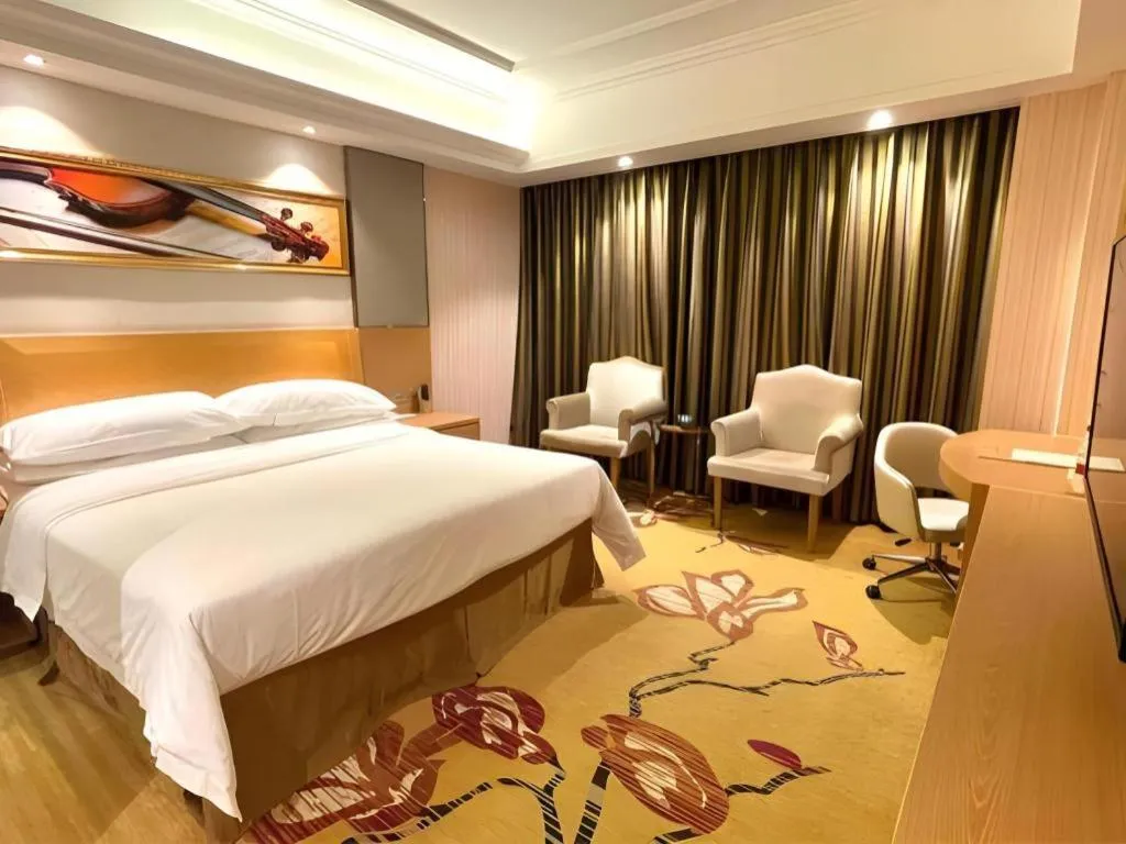 Bed in Vienna Hotel Guangzhou Baiyun Airport Huadu Avenue