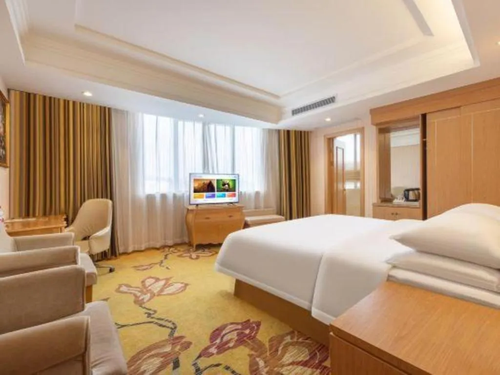 Bed in Vienna Hotel Guangzhou Baiyun Airport Huadu Avenue
