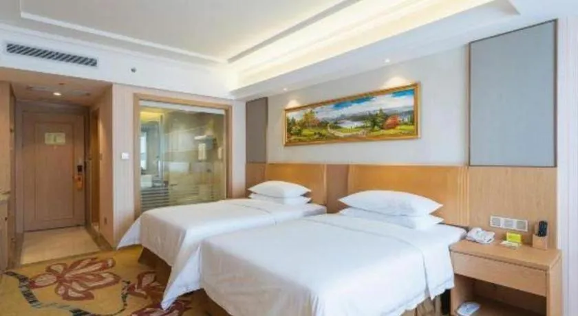 Bed in Vienna Hotel Guangzhou Baiyun Airport Huadu Avenue