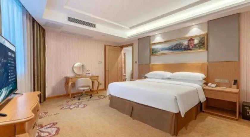 Bed in Vienna Hotel Guangzhou Baiyun Airport Huadu Avenue