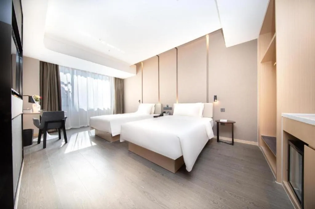 Bed in Atour Hotel Wuhan Chuhehan Street Hanxiu Theater