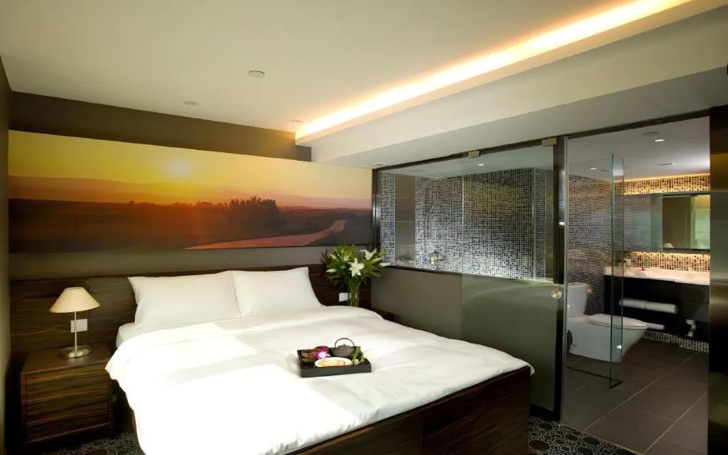 Bed in J Link Hotel