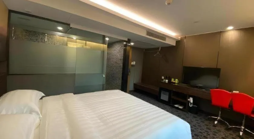 Bed in J Link Hotel