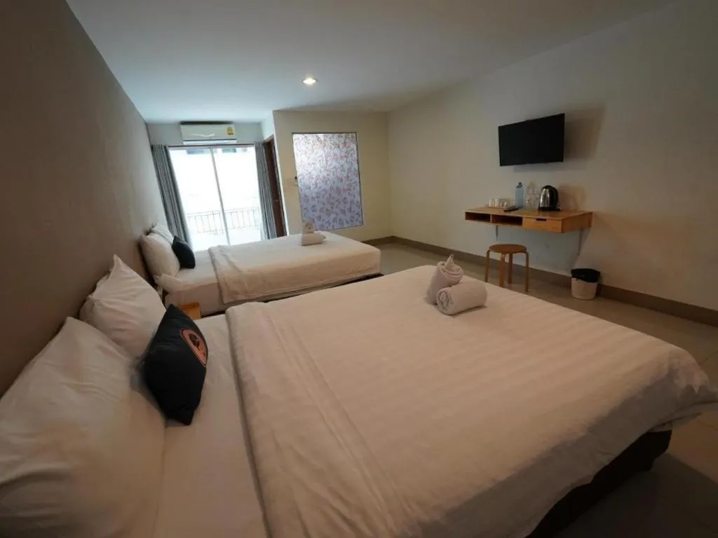 Bed in RoomQuest Chiang Mai Tha Sala